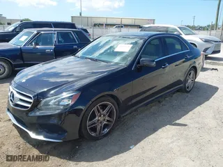 2014 Mercedes-Benz E-Class E 350 Luxury with VIN WDDHF8JB7EA791635, listed as a IAAI auction lot 41999708 with 133,509 mi miles. Bid and sale history available at carsss.com. Image 2.