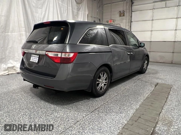 2011 Honda Odyssey EX-L with VIN 5FNRL5H62BB047183, listed as a Copart auction lot 56378645 with 125,446 mi miles and Clean Title. Bid and sale history available at DreamBid. Image 4.
