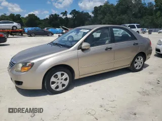 2009 Kia Spectra EX with VIN KNAFE221195600794, listed as a Copart auction lot 68090154 with 77,037 mi miles and Salvage Title. Bid and sale history available at carsss.com. Image 1.