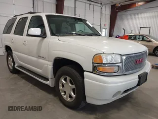 2002 GMC Yukon Denali z VIN 1GKEK63U92J115859, wystawiony jako IAAI lot #42367051 z przebiegiem 209 080 mil mil oraz . Historia ofert i sprzedaży dostępna na DreamBid. Obrazek 1.