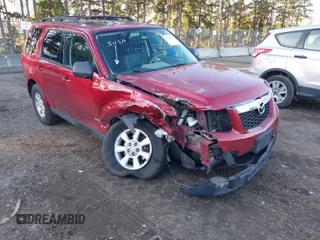 2008 Mazda Tribute Touring with VIN 4F2CZ96188KM14523, listed as a IAAI auction lot 41385257 with 197,453 mi miles. Bid and sale history available at carsss.com. Image 1.