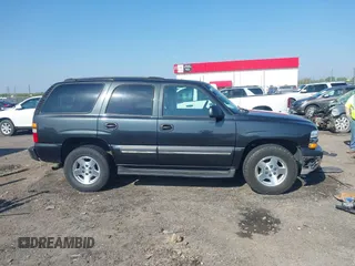 2004 Chevrolet Tahoe LS with VIN 1GNEC13V04R178784, listed as a IAAI auction lot 42013755 with 126,162 mi miles. Bid and sale history available at carsss.com. Image 13.