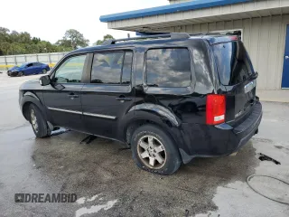 2010 Honda Pilot Touring with VIN 5FNYF4H92AB019812, listed as a Copart auction lot 49818515 with 165,638 mi miles and Salvage Title. Bid and sale history available at carsss.com. Image 2.
