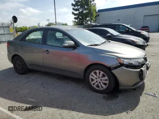 2010 Kia Forte EX z VIN KNAFU4A27A5260564, wystawiony jako Copart lot #55440345 z przebiegiem 169 444 mil mil oraz Szkoda całkowita • Salvage title. Historia ofert i sprzedaży dostępna na DreamBid. Obrazek 4.