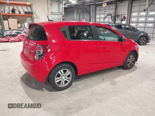 2014 Chevrolet Sonic LT with VIN 1G1JC6SB1E4125174, listed as a IAAI auction lot 41521991 with 125,490 mi miles. Bid and sale history available at carsss.com. Image 4.
