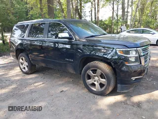 2015 Chevrolet Tahoe LTZ with VIN 1GNSKCKC3FR204671, listed as a IAAI auction lot 42611315 with 162,128 mi miles and . Bid and sale history available at DreamBid. Image 1.