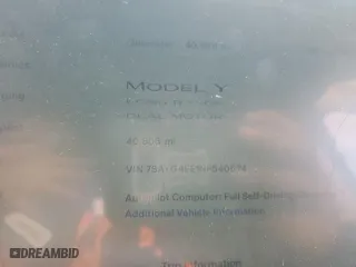 2022 Tesla Model Y Long Range with VIN 7SAYGAEE1NF540574, listed as a Copart auction lot 49001125 with 40,806 mi miles and Salvage Title. Bid and sale history available at carsss.com. Image 9.