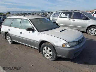 1999 Subaru Legacy Wagon Outback with VIN 4S3BG6858X7642460, listed as a IAAI auction lot 40957251 with 206,546 mi miles. Bid and sale history available at carsss.com. Image 1.