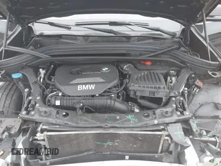 2017 BMW X1 xDrive28i with VIN WBXHT3C31H5F72958, listed as a IAAI auction lot 41782257 with 134,829 mi miles. Bid and sale history available at carsss.com. Image 10.