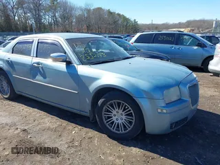 2009 Chrysler 300 LX with VIN 2C3KA43D19H552759, listed as a IAAI auction lot 41702989 with 172,572 mi miles. Bid and sale history available at carsss.com. Image 1.