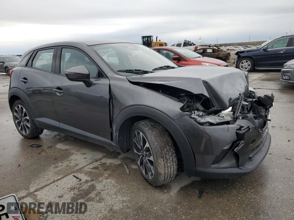 2019 Mazda CX-3 Touring with VIN JM1DKFC73K0412441, listed as a Copart auction lot 89316845 with 56,312 mi miles and Salvage Title. Bid and sale history available at carsss.com. Image 4.