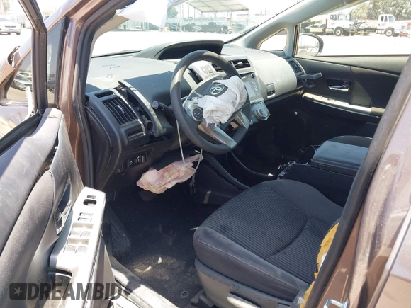 2015 Toyota Prius Two with VIN JTDZN3EU8FJ028072, listed as a IAAI auction lot 39747470 with 62,979 mi miles and . Bid and sale history available at DreamBid. Image 5.