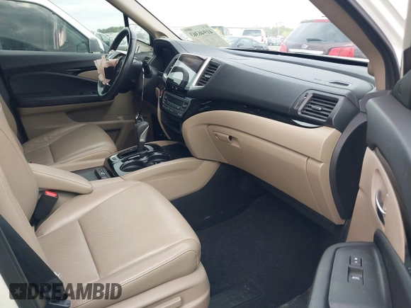 2019 Honda Ridgeline RTL-E with VIN 5FPYK3F78KB018356, listed as a IAAI auction lot 41946363 with 61,472 mi miles and . Bid and sale history available at DreamBid. Image 5.