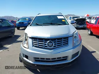2014 Cadillac SRX with VIN 3GYFNAE31ES576016, listed as a IAAI auction lot 42130992 with 160,114 mi miles and . Bid and sale history available at DreamBid. Image 12.