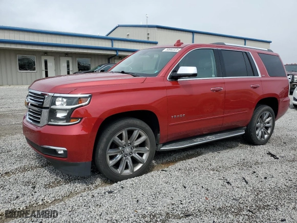 2015 Chevrolet Tahoe LTZ with VIN 1GNSKCKCXFR723104, listed as a Copart auction lot 50660325 with 198,740 mi miles and Salvage Title. Bid and sale history available at carsss.com. Image 1.