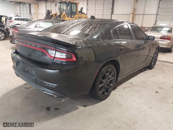 2016 Dodge Charger SXT with VIN 2C3CDXJG6GH341175, listed as a IAAI auction lot 41567137 with 146,476 mi miles. Bid and sale history available at carsss.com. Image 4.