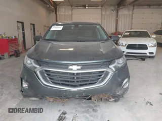 2018 Chevrolet Equinox LT z VIN 3GNAXJEV5JS569101, wystawiony jako IAAI lot #42055496 z przebiegiem 173 494 mil mil oraz . Historia ofert i sprzedaży dostępna na DreamBid. Obrazek 12.