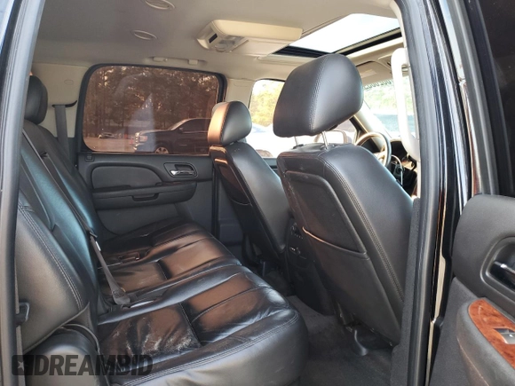 2011 Chevrolet Suburban LT with VIN 1GNSCJE03BR158949, listed as a Copart auction lot 86260394 with 197,012 mi miles and Salvage Title. Bid and sale history available at carsss.com. Image 11.