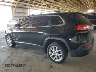 2018 Jeep Cherokee Latitude with VIN 1C4PJLCX6JD531185, listed as a Copart auction lot 61922815 with 246,133 mi miles and Salvage title. Bid and sale history available at DreamBid. Image 2.