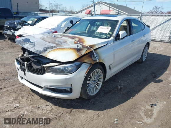 2015 BMW 3 Series 328i Gran Turismo xDrive with VIN WBA3X5C54FD562088, listed as a IAAI auction lot 41894595 with Not provided miles and . Bid and sale history available at DreamBid. Image 2.