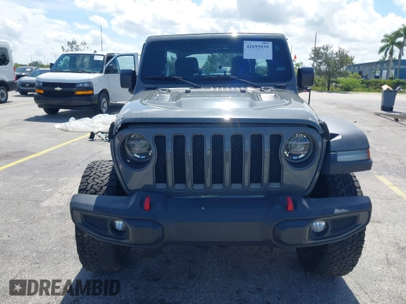 2019 Jeep Wrangler Unlimited Rubicon with VIN 1C4HJXFN9KW507281, listed as a IAAI auction lot 42695939 with 60,802 mi miles and . Bid and sale history available at DreamBid. Image 6.