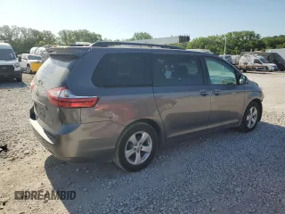 2016 Toyota Sienna LE AAS с VIN 5TDKK3DC8GS755476, выставлен на аукционе Copart как лот 56951595 с пробегом 228 678 миль миль и Списание • Salvage title. История ставок и продаж доступна на DreamBid. Изображение 3.