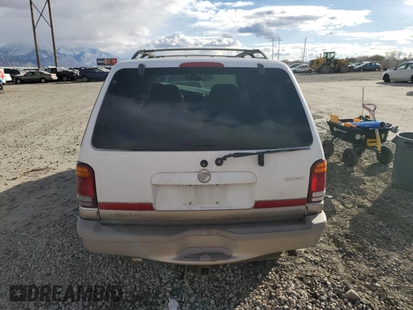 2000 Mercury Mountaineer with VIN 4M2DU66P8YUJ15148, listed as a Copart auction lot 84107204 with 194,511 mi miles and Salvage title. Bid and sale history available at DreamBid. Image 6.