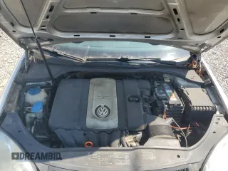 2007 Volkswagen Rabbit z VIN WVWBR71K07W240020, wystawiony jako Copart lot #70138334 z przebiegiem 156 800 mil mil oraz Czysty tytuł • Clean title. Historia ofert i sprzedaży dostępna na DreamBid. Obrazek 11.