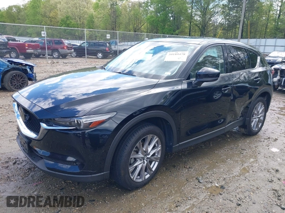2019 Mazda CX-5 Grand Touring with VIN JM3KFBDM7K0518603, listed as a IAAI auction lot 39185478 with 42,805 mi miles. Bid and sale history available at carsss.com. Image 2.