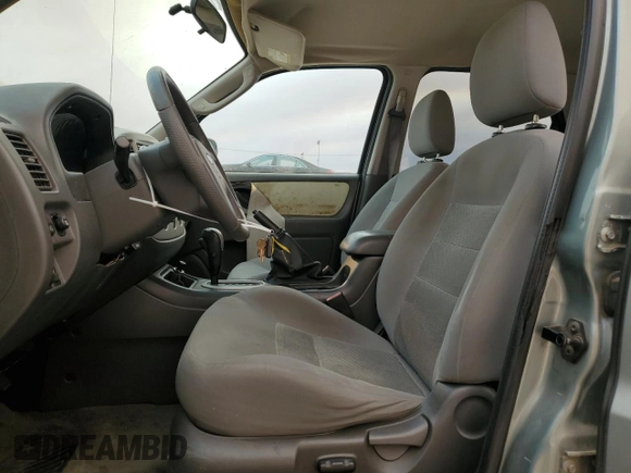 2005 Ford Escape XLT with VIN 1FMYU93Z35KC52175, listed as a Copart auction lot 71214694 with 125,278 mi miles and Salvage Title. Bid and sale history available at carsss.com. Image 7.