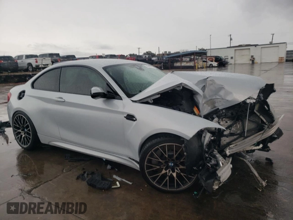 2020 BMW M2 Competition with VIN WBS2U7C01L7D66378, listed as a Copart auction lot 86432704 with 56,973 mi miles and Salvage Title. Bid and sale history available at carsss.com. Image 4.