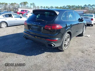 2016 Porsche Cayenne with VIN WP1AA2A21GLA02456, listed as a IAAI auction lot 41309026 with 136,266 mi miles. Bid and sale history available at carsss.com. Image 4.