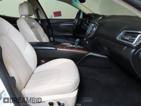 2014 Maserati Ghibli S Q4 z VIN ZAM57RTA7E1094580, wystawiony jako Copart lot #58866195 z przebiegiem 79 463 mil mil oraz Szkody całkowita. Historia ofert i sprzedaży dostępna na DreamBid. Obrazek 5.