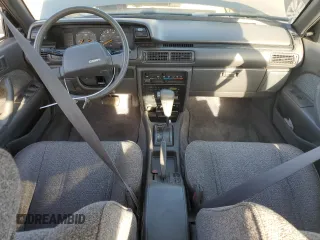 1989 Toyota Camry z VIN JT2SV21E8K0314703, wystawiony jako Copart lot #76053194 z przebiegiem 124 873 mil mil oraz Nie do naprawy • Non repairable. Historia ofert i sprzedaży dostępna na DreamBid. Obrazek 8.