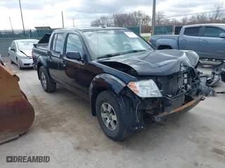 2009 Nissan Frontier SE with VIN 1N6AD07U09C404023, listed as a IAAI auction lot 41883164 with 100,724 mi miles. Bid and sale history available at carsss.com. Image 1.
