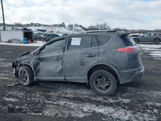2017 Toyota RAV4 LE with VIN JTMZFREV9HJ119332, listed as a IAAI auction lot 41257790 with 94,992 mi miles and . Bid and sale history available at carsss.com. Image 14.