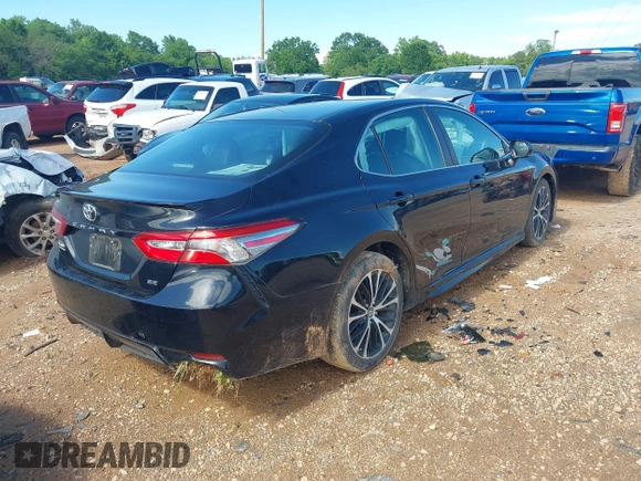 2018 Toyota Camry LE z VIN 4T1B11HKXJU652275, wystawiony jako IAAI lot #42245625 z przebiegiem 49 596 mil mil oraz . Historia ofert i sprzedaży dostępna na DreamBid. Obrazek 4.