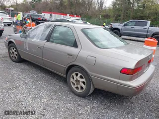 1998 Toyota Camry LE with VIN 4T1BF28K0WU066098, listed as a IAAI auction lot 41971003 with 324,180 mi miles. Bid and sale history available at carsss.com. Image 3.