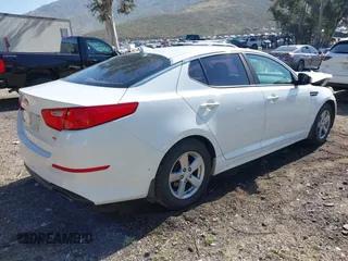 2015 Kia Optima LX with VIN 5XXGM4A76FG456677, listed as a IAAI auction lot 41976831 with 138,008 mi miles. Bid and sale history available at carsss.com. Image 4.