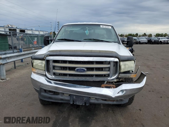2002 Ford Super Duty F-250 XL with VIN 1FTNW21FX2EB12653, listed as a Copart auction lot 68732594 with 282,115 mi miles and Salvage Title. Bid and sale history available at carsss.com. Image 5.