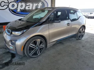 2015 BMW i3 z VIN WBY1Z4C56FV502952, wystawiony jako Copart lot #54003965 z przebiegiem 104 615 mil mil oraz Tytuł czysty. Historia ofert i sprzedaży dostępna na DreamBid. Obrazek 1.