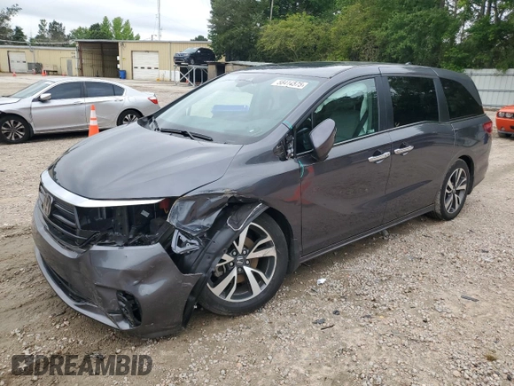 2023 Honda Odyssey Touring with VIN 5FNRL6H86PB024066, listed as a Copart auction lot 58414575 with 29,827 mi miles and Salvage title. Bid and sale history available at DreamBid. Image 1.