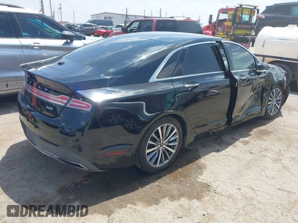 2017 Lincoln MKZ Premiere z VIN 3LN6L5A95HR648064, wystawiony jako IAAI lot #42115558 z przebiegiem 86 701 mil mil oraz . Historia ofert i sprzedaży dostępna na DreamBid. Obrazek 4.