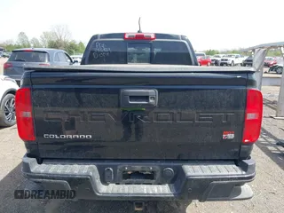 2021 Chevrolet Colorado 4WD Z71 z VIN 1GCGTDEN1M1256939, wystawiony jako IAAI lot #42071364 z przebiegiem 38 972 mil mil oraz . Historia ofert i sprzedaży dostępna na DreamBid. Obrazek 16.