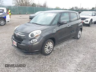 2014 FIAT 500L Easy with VIN ZFBCFABH7EZ028517, listed as a IAAI auction lot 41860321 with 79,665 mi miles and . Bid and sale history available at DreamBid. Image 2.