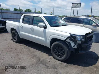 2023 Nissan Frontier SV z VIN 1N6ED1EJ5PN643830, wystawiony jako IAAI lot #42155951 z przebiegiem 28 599 mil mil oraz . Historia ofert i sprzedaży dostępna na DreamBid. Obrazek 1.
