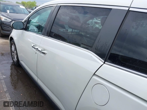 2015 Honda Odyssey EX-L with VIN 5FNRL5H6XFB003972, listed as a IAAI auction lot 41998663 with 171,554 mi miles and . Bid and sale history available at DreamBid. Image 14.