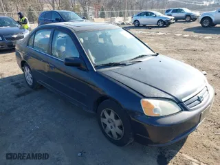 2002 Honda Civic EX with VIN 2HGES26842H549564, listed as a IAAI auction lot 41449790 with 137,844 mi miles. Bid and sale history available at carsss.com. Image 6.