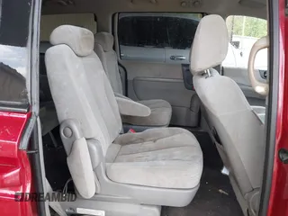 2009 Kia Sedona LX with VIN KNDMB233X96277536, listed as a IAAI auction lot 42108653 with 260,258 mi miles and . Bid and sale history available at carsss.com. Image 8.