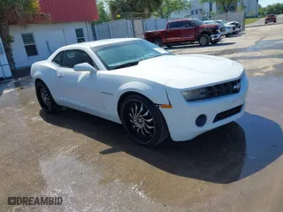 2013 Chevrolet Camaro LS with VIN 2G1FE1E3XD9238088, listed as a IAAI auction lot 41833248 with 219,921 mi miles. Bid and sale history available at carsss.com. Image 1.